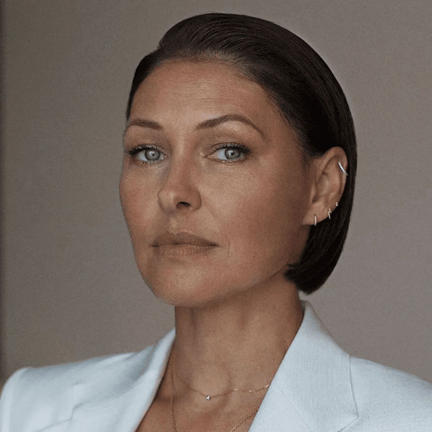 Emma Willis wears a softly slicked back bob